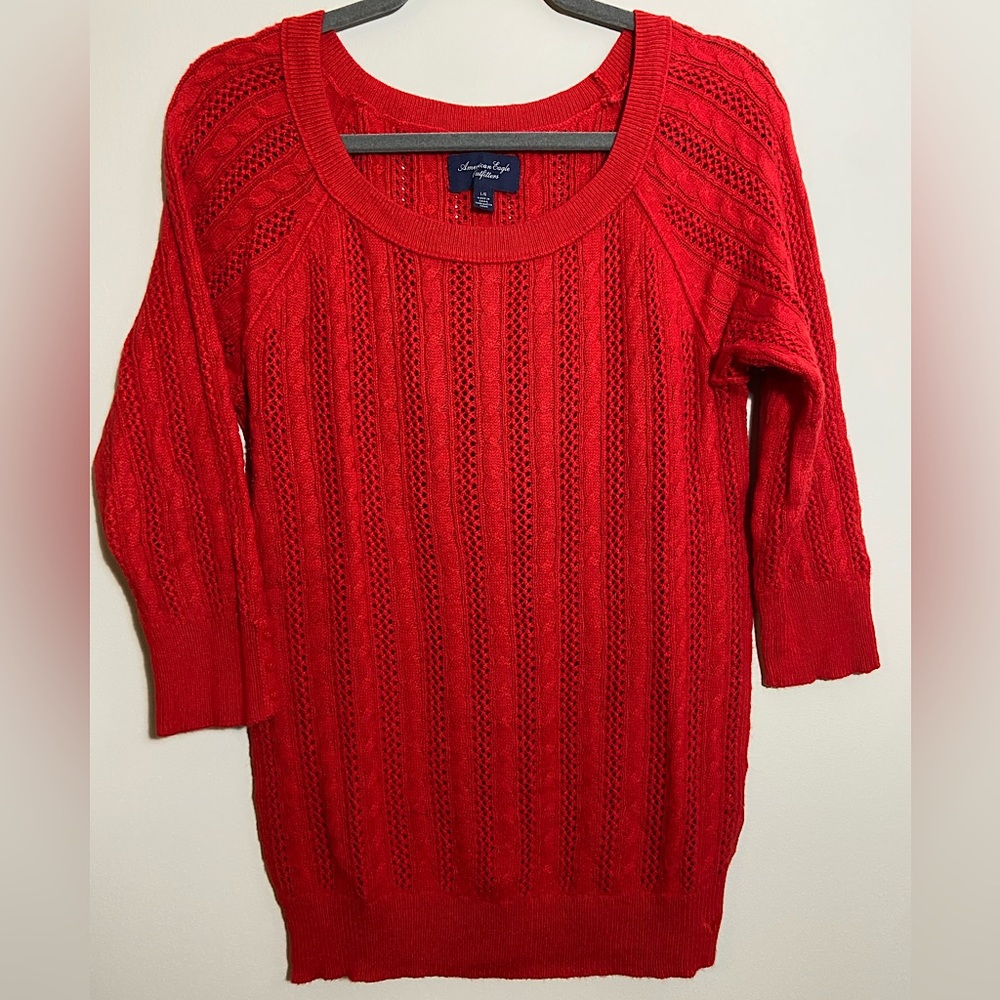 Tomato red sweater with 3/4 length sleeves